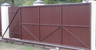 Купить откатные ворота из профнастила Каменск-Уральский, цена от 1742 руб.
